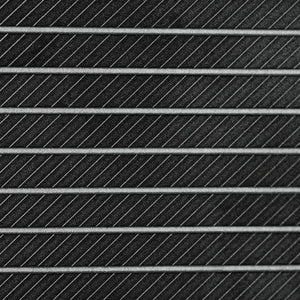 Close-up macro of the Juggernaut Max full face wedge face, showing the milled groove pattern running the full width of the striking surface.